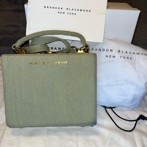 Brandon Blackwood purse. Kendrick Trunk- Denim green